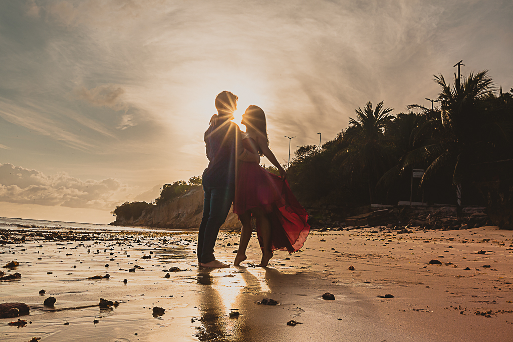 French photographer in Brazil for honeymoon sessions - Couple silhouette stunning sunrise at the beach
