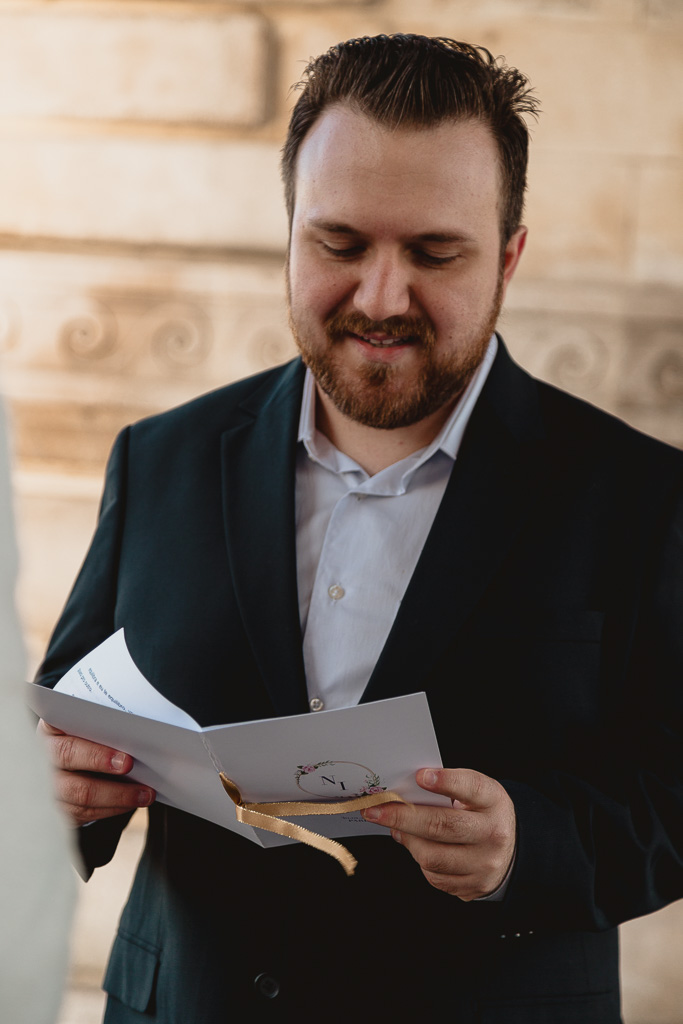 Paris Elopement photographer - Groom exchange vows